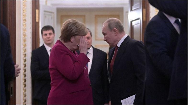 Путин и меркель